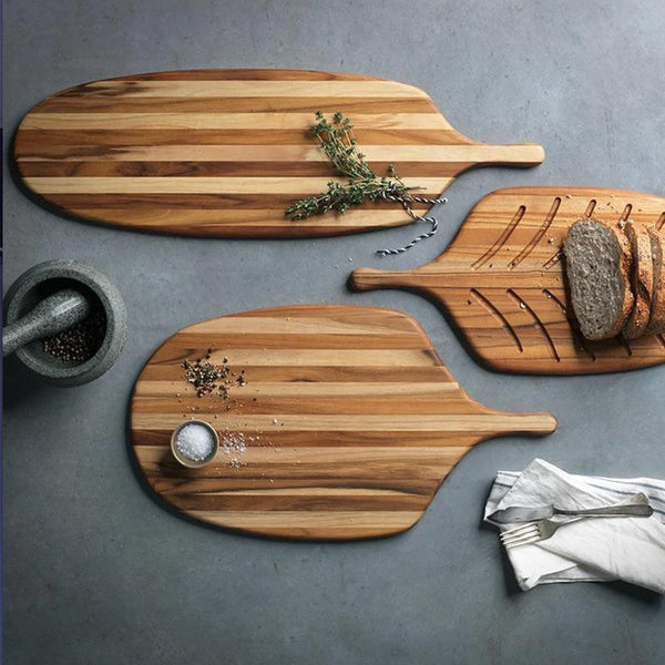 http://discovergourmet.com/cdn/shop/products/teakhaus-teakhaus-large-canoe-paddle-cutting-board-jl-hufford-cutting-boards-14524099231826_grande.jpg?v=1654223564