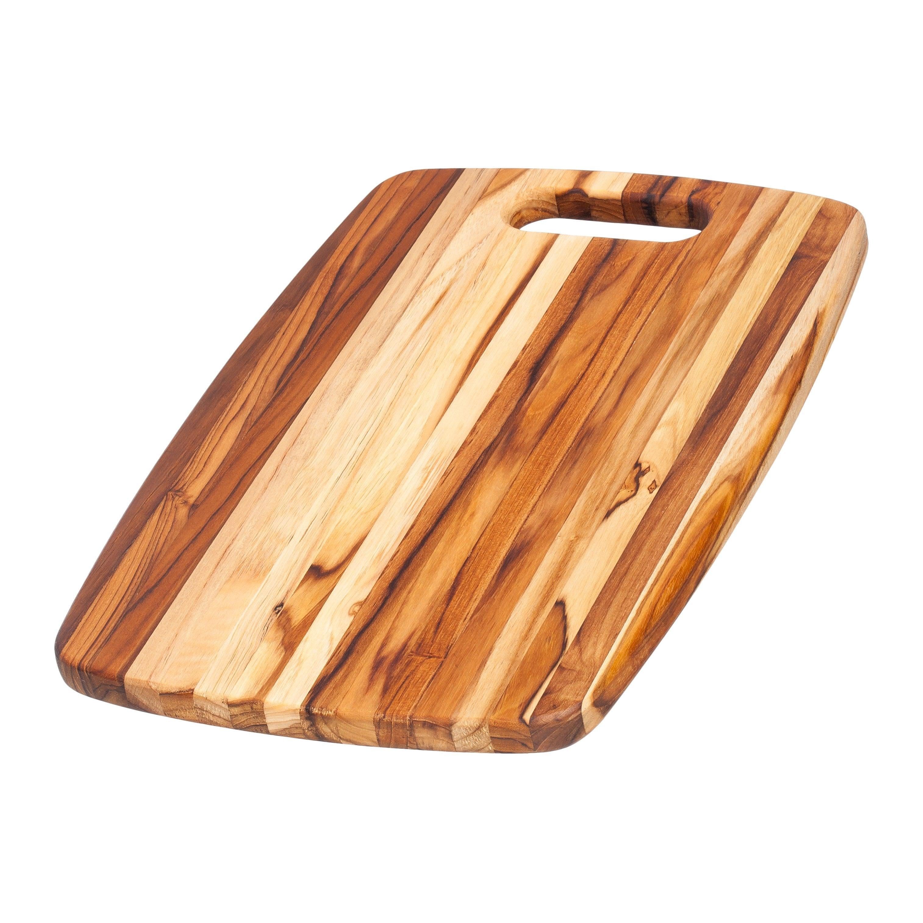 https://discovergourmet.com/cdn/shop/products/teakhaus-proteak-rectangle-edge-grain-with-centered-hole-18-x-12-x-0-75-jl-hufford-cutting-boards-1014473129996.jpg?v=1654223598